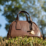 boat shape vegetable-tanned leather handbag