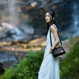 boat shape vegetable-tanned leather handbag