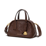 boat shape vegetable-tanned leather handbag